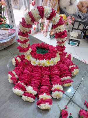Elegant floral tray decoration with fresh flowers for wedding and engagement functions