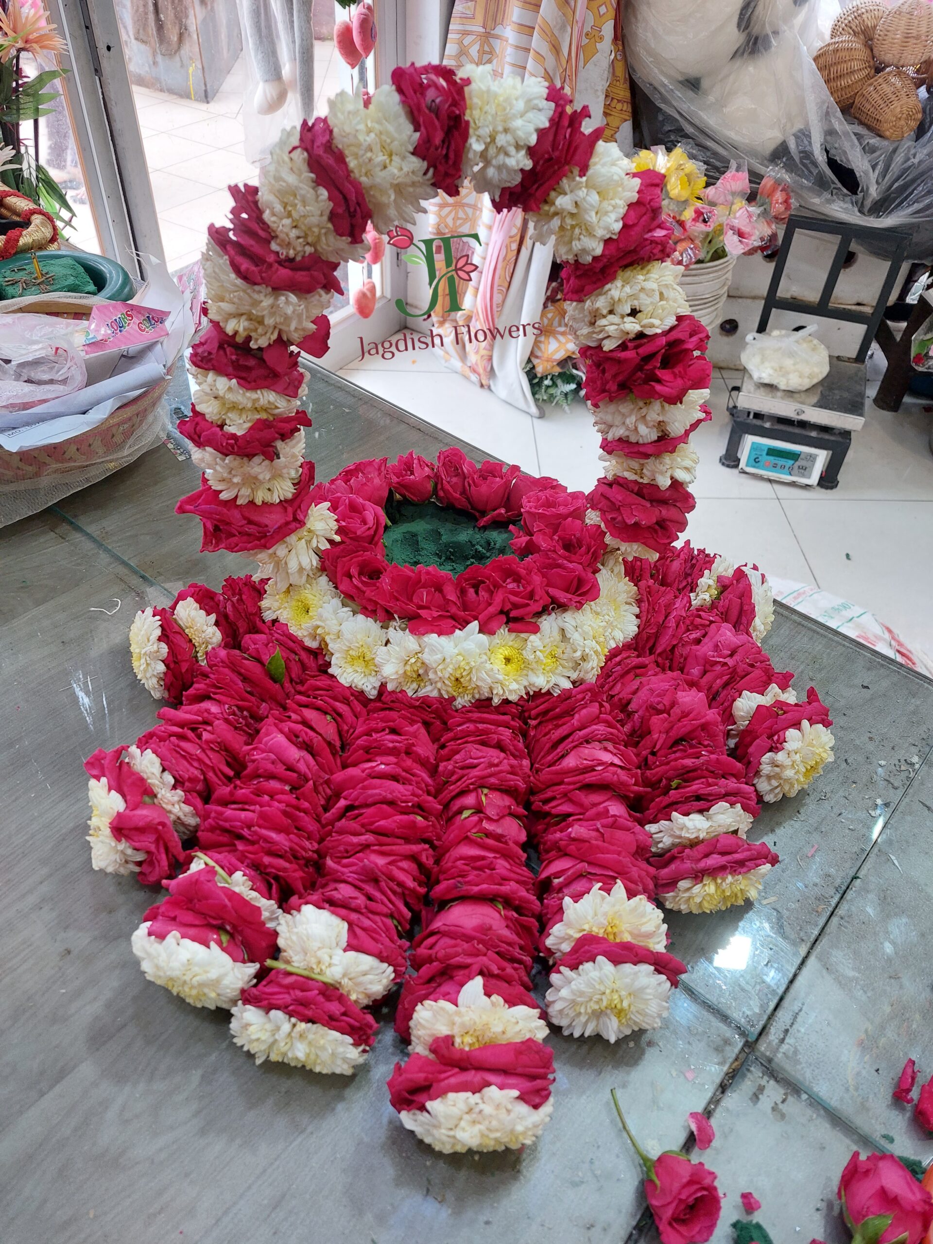 Elegant floral tray decoration with fresh flowers for wedding and engagement functions