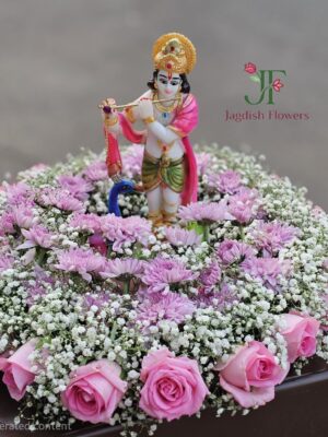 Premium wedding gift tray decoration with fresh flowers and floral styling and Krishna Statue
