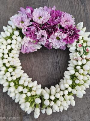 Floral hair brooch with fresh flowers for bridesmaid and wedding hairstyles