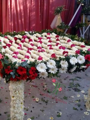 Traditional floral khatali decoration with fresh flowers for bridal entry