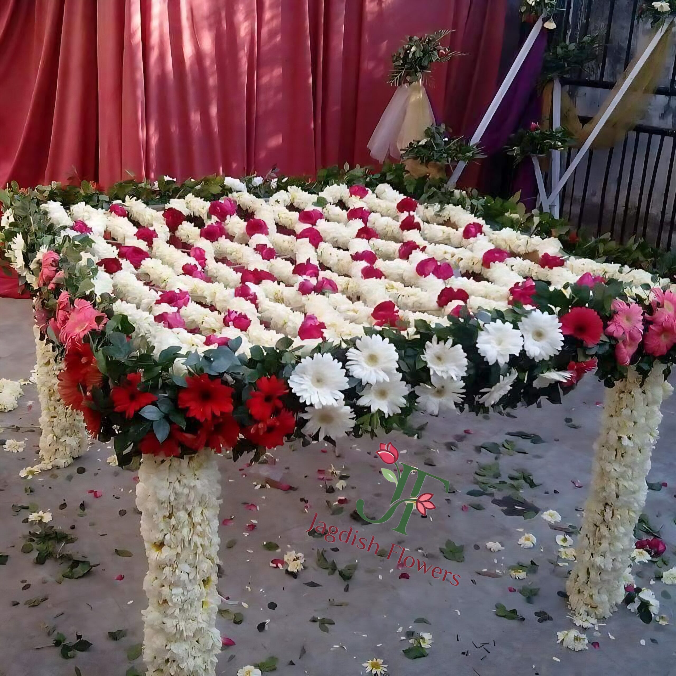 Traditional floral khatali decoration with fresh flowers for bridal entry