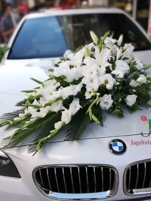 White Wedding Car Decoration with Pink Fancy Net