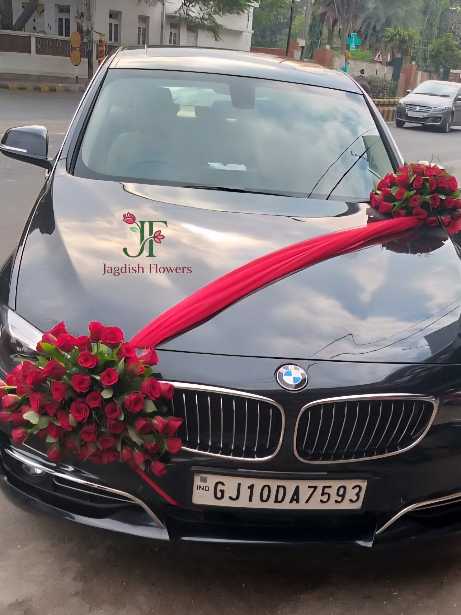 Premium red flower wedding car decoration with elegant floral styling
