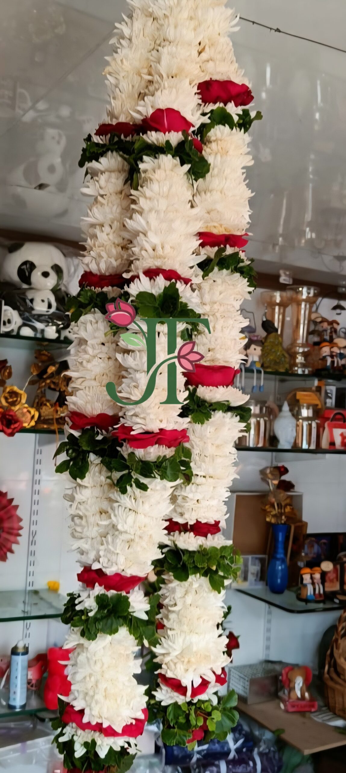 Royal floral mala with fresh flowers for spiritual celebrations