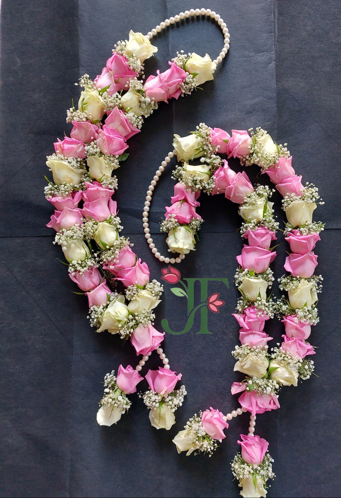 Designer wedding mala with fresh flower arrangements for weddings