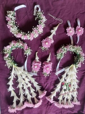 Baby pink floral jewellery for bridal and engagement occasions