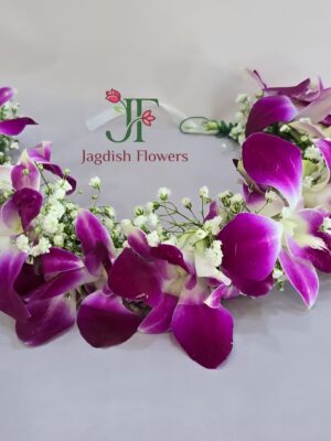 Elegant floral veni with fresh flowers for wedding and festival hairstyles