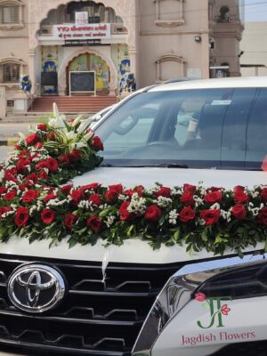 Elegant floral wedding car decoration with colorful fresh flower arrangements