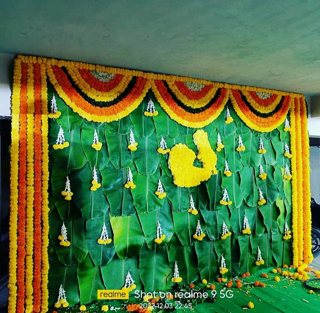 Modern floral wedding backdrop decoration with fresh flower hangings