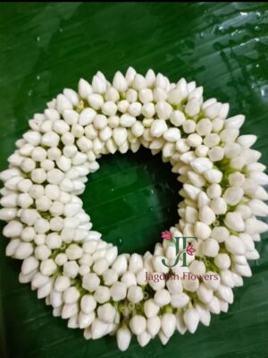 Traditional wedding veni with fresh white flowers for bridal hairstyle