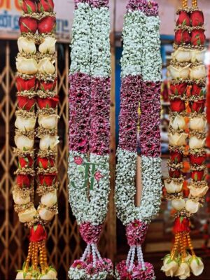 Traditional floral wedding haar with fresh roses for wedding rituals