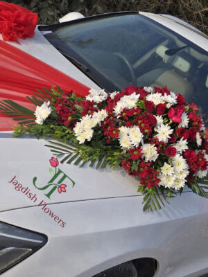 Red rose wedding car decoration with fresh flowers for bridal entry car design
