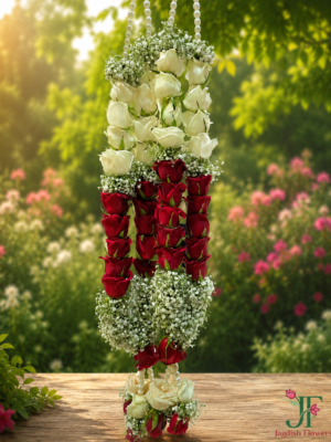 Handcrafted white and red rose wedding varmala with fresh floral detailing for a traditional marriage ceremony in Rajkot.