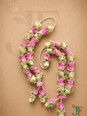 Premium pink and white rose wedding varmala handcrafted with fresh flowers for a traditional marriage ceremony in Rajkot.