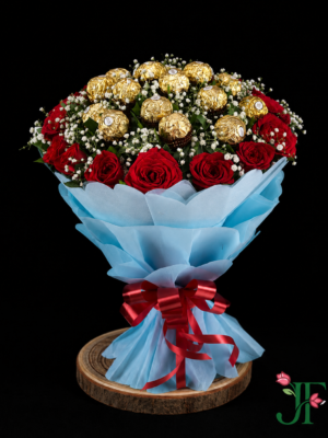 Red rose and Ferrero Rocher chocolate bouquet with premium wrapping for romantic gifting in Rajkot