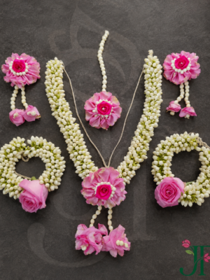 Tagar and Pink Rose Flower Ornament at Jagdish Flowers