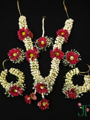 Tagar and Red Bottam Flower Ornament at Jagdish Flowers