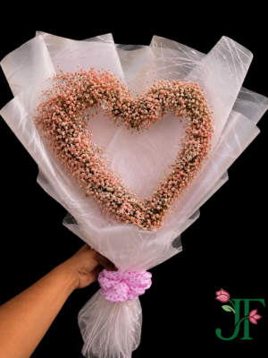 pink heart flower bouquet wrapped in premium pink paper with matching satin ribbon for romantic gifting in Rajkot
