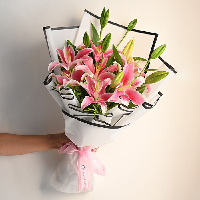 Premium Pink Lilies with Gypsophila Flower Bouquet at Jagdish Flowers